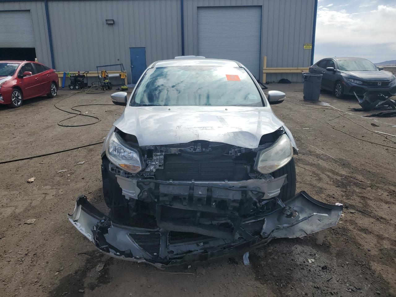 2014 Ford Focus VIN 1FADP3F26EL216843 Copart auction photo, front end / rear end damage thumbnail 5