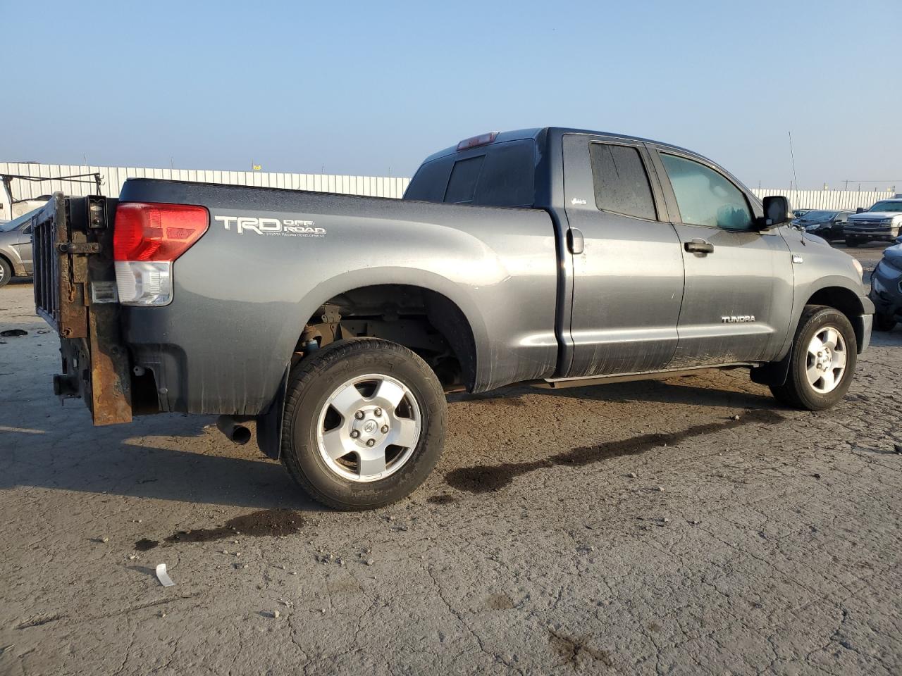2010 Toyota Tundra VIN 5TFUM5F10AX003119 Copart auction photo, side damage thumbnail 3
