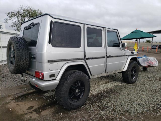 2002 Mercedes-Benz G-klasse VIN WDCYR49EX2X128555 Copart auction photo, rear end damage thumbnail 3