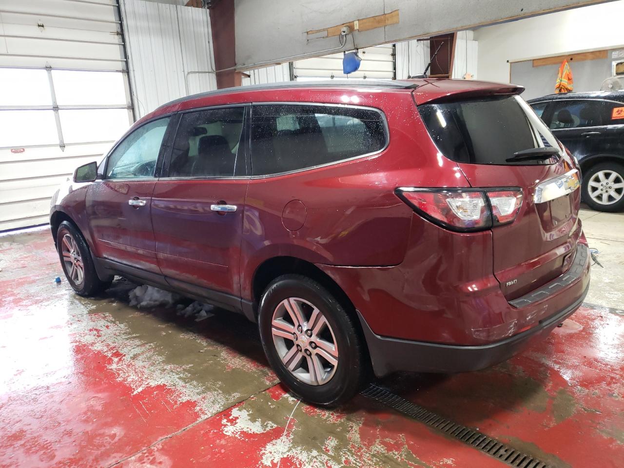2015 Chevrolet Traverse VIN 1GNKVHKD9FJ375565 Copart auction photo, side / rear end damage thumbnail 2