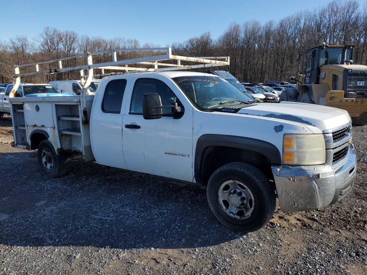 2007 Chevrolet Silverado VIN 1GBHC29K57E509173 Copart auction photo, side / front end damage thumbnail 4