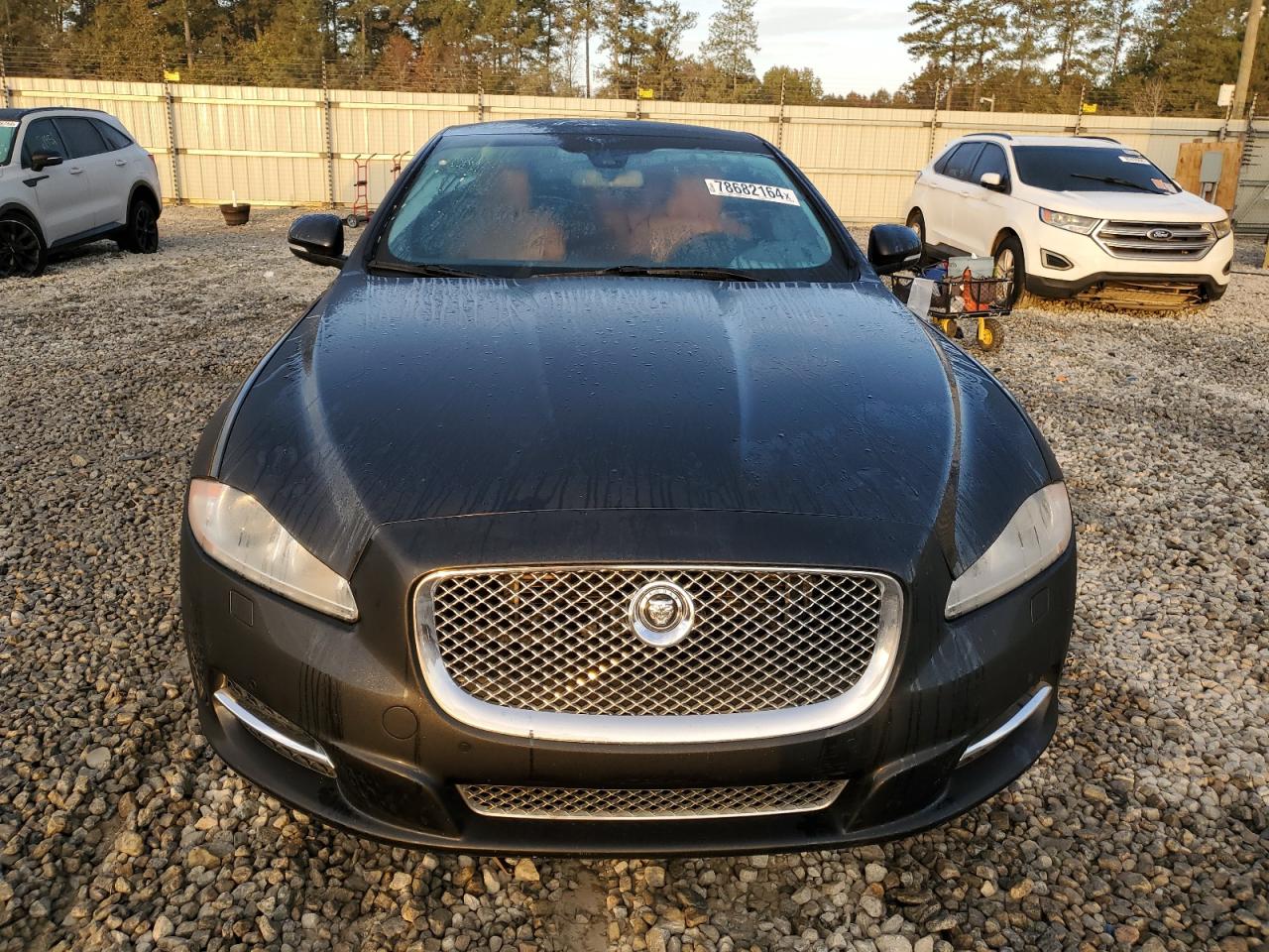 2013 Jaguar XJ VIN SAJWJ1CD2D8V47727 Copart auction photo, rear end / minor dent/scratches damage thumbnail 5