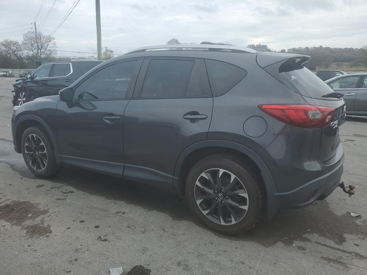 2016 Mazda CX-5 VIN JM3KE4DY5G0607837 Copart auction photo, minor dent/scratches damage thumbnail 2