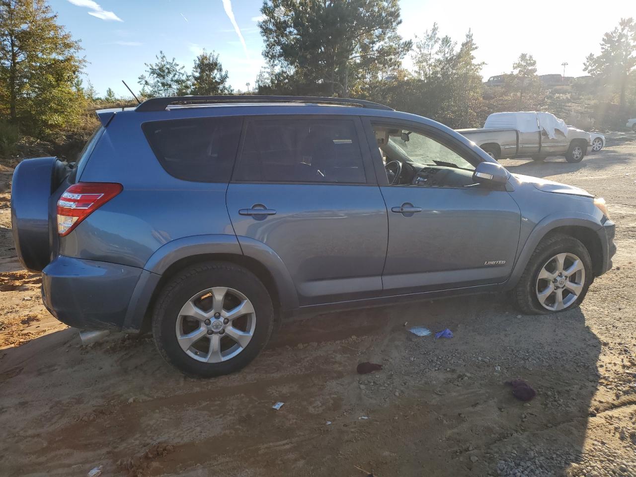 2010 Toyota RAV 4 VIN 2T3YF4DV1AW023752 Copart auction photo, side / front end damage thumbnail 3