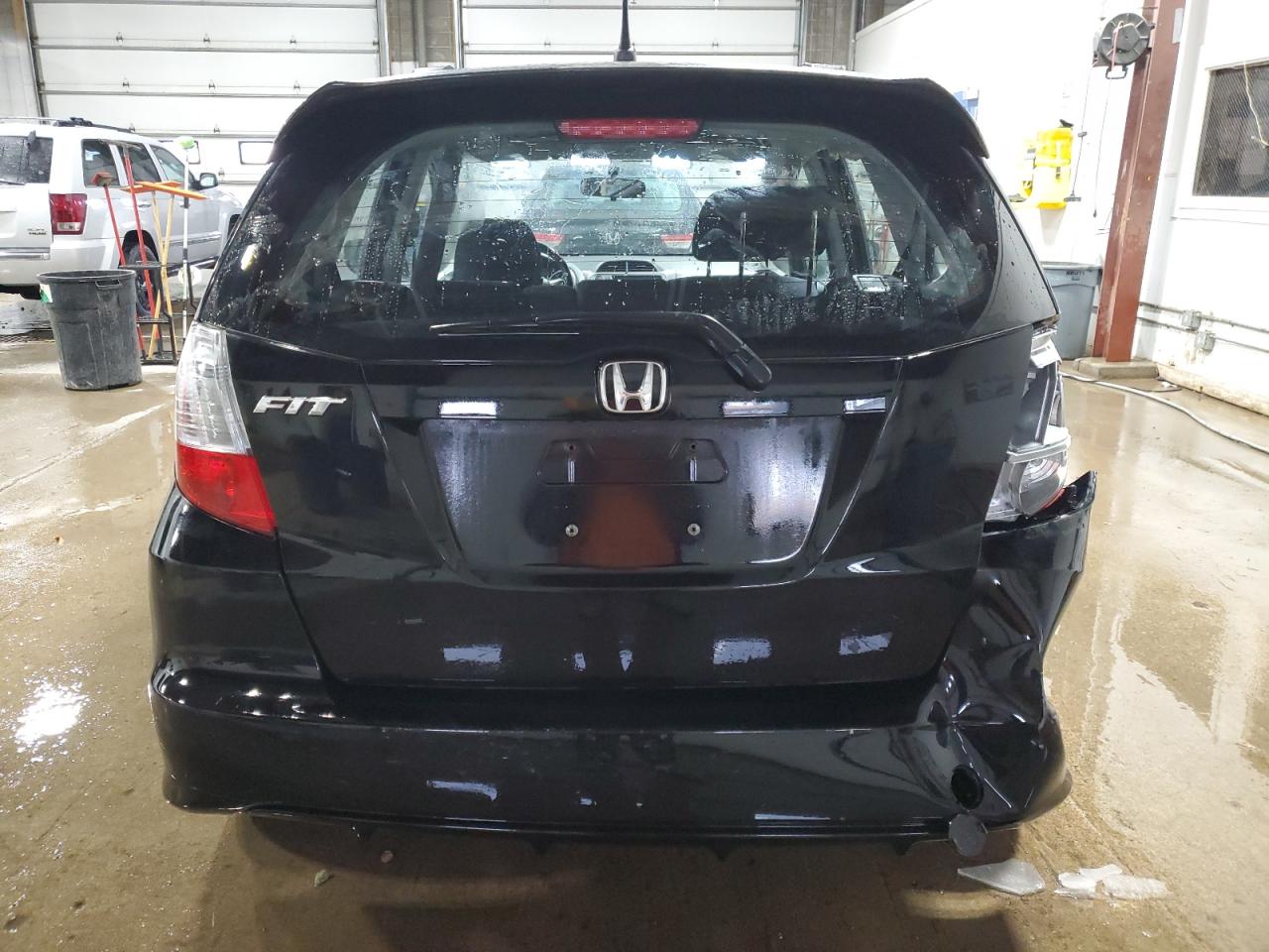 2010 Honda Fit VIN JHMGE8H42AC005995 Copart auction photo, rear end damage thumbnail 6