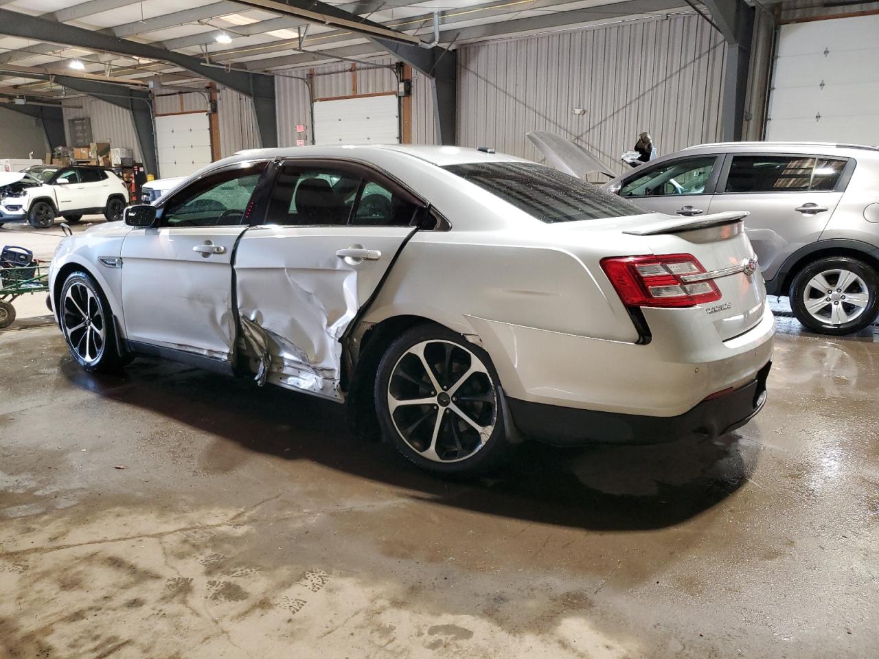 2014 Ford Taurus VIN 1FAHP2E88EG130864 Copart auction photo, side damage thumbnail 2
