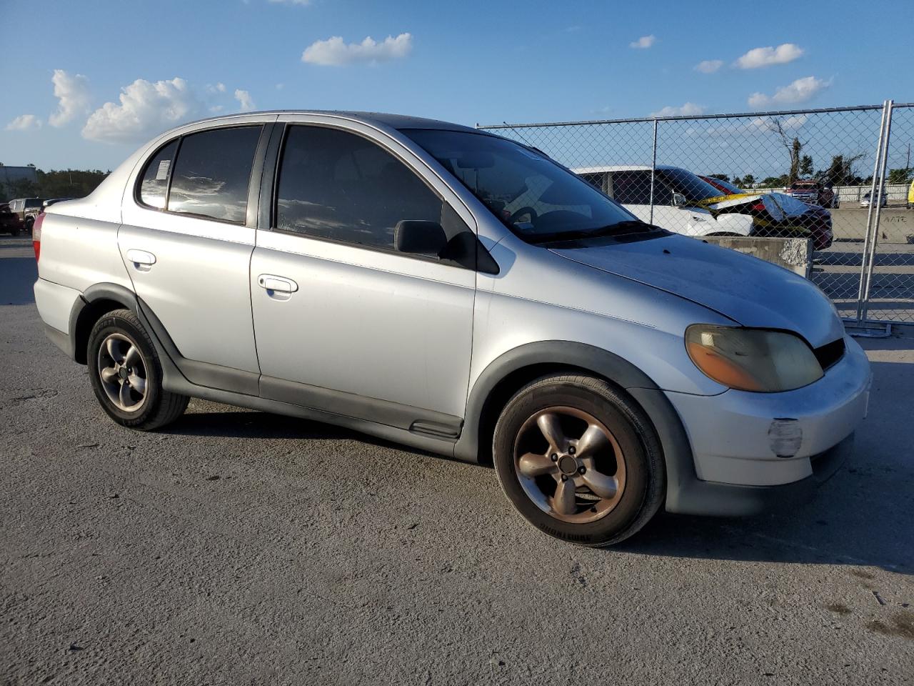 2000 Toyota Echo VIN JTDBT123XY0066810 Copart auction photo, rear end damage thumbnail 4