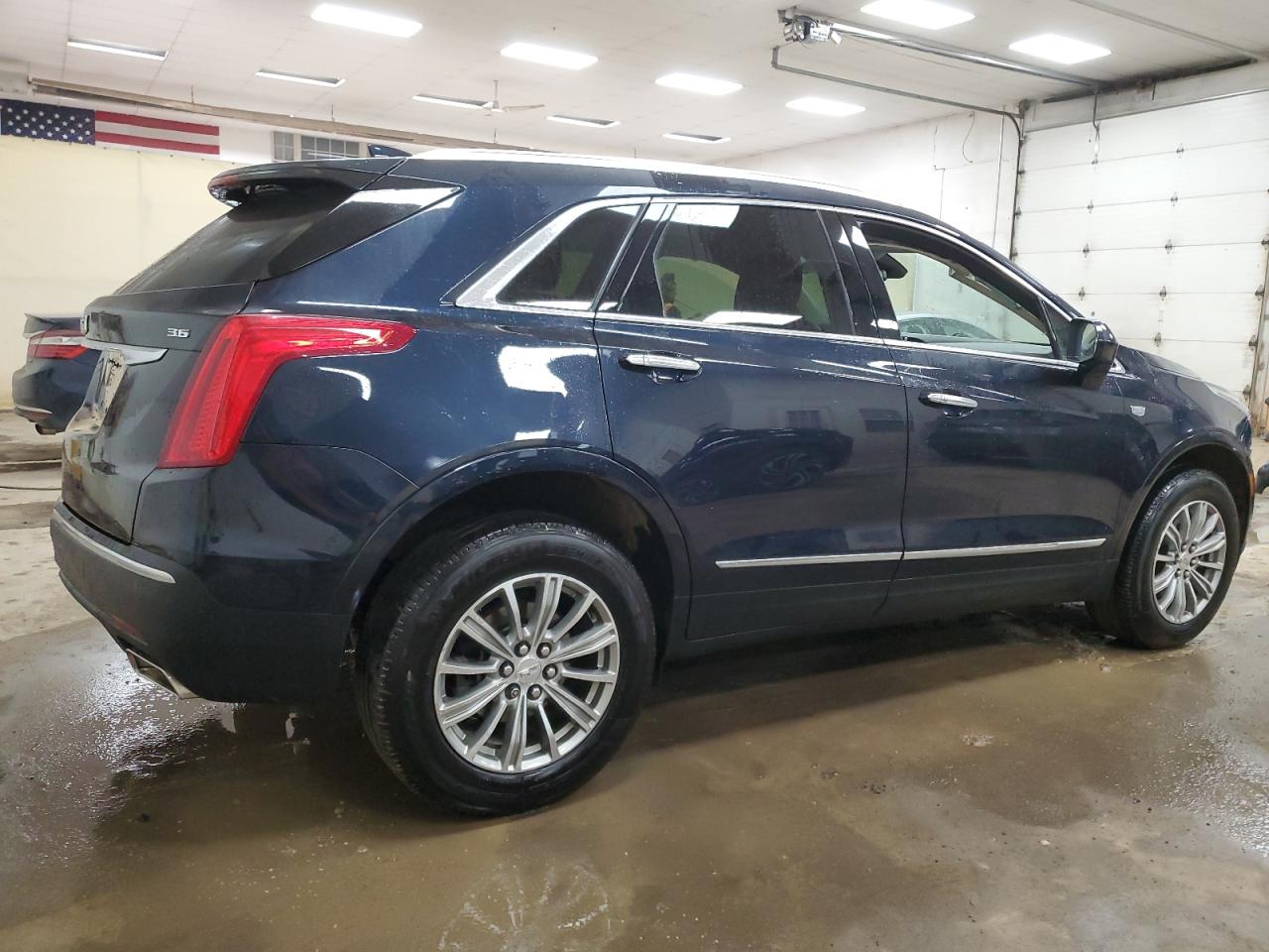 2017 Cadillac XT5 VIN 1GYKNDRS3HZ254230 Copart auction photo, side / minor dent/scratches damage thumbnail 3