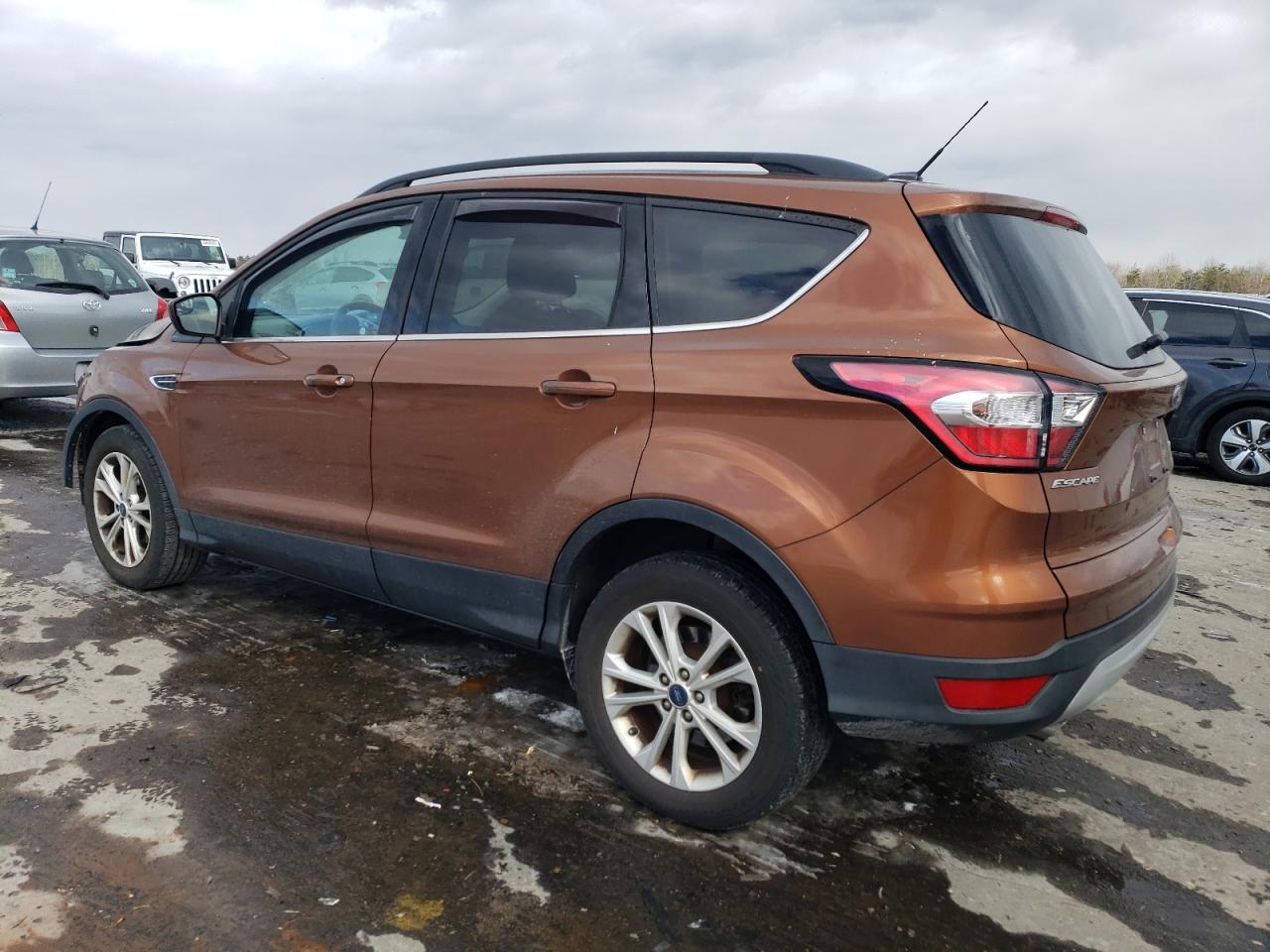 2017 Ford Escape VIN 1FMCU0GD5HUC97700 Copart auction photo, front end / minor dent/scratches damage thumbnail 2