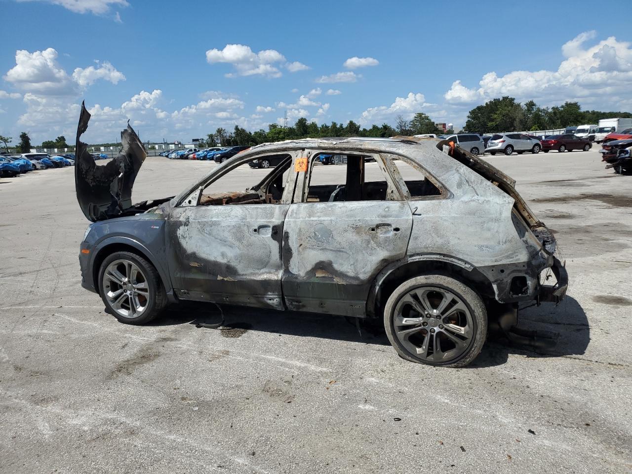 2016 Audi Q3 VIN WA1GFCFS4GR024437 Copart auction photo, burn damage thumbnail 2