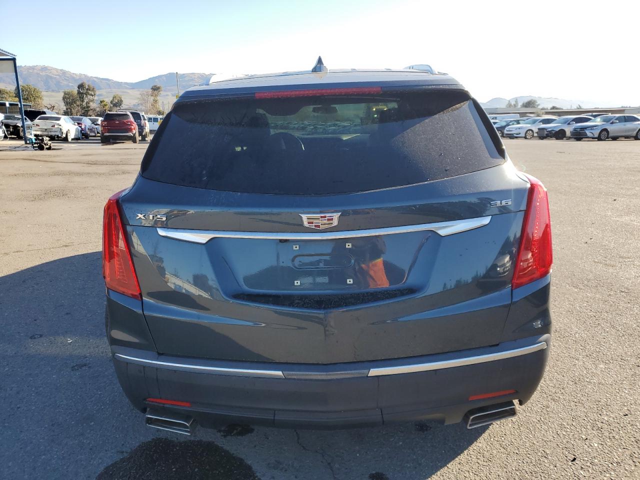 2019 Cadillac XT5 VIN 1GYKNARSXKZ184358 Copart auction photo, rear end / front end damage thumbnail 6