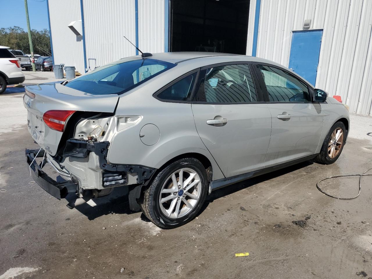 2016 Ford Focus VIN 1FADP3F25GL348897 Copart auction photo, rear end damage thumbnail 3