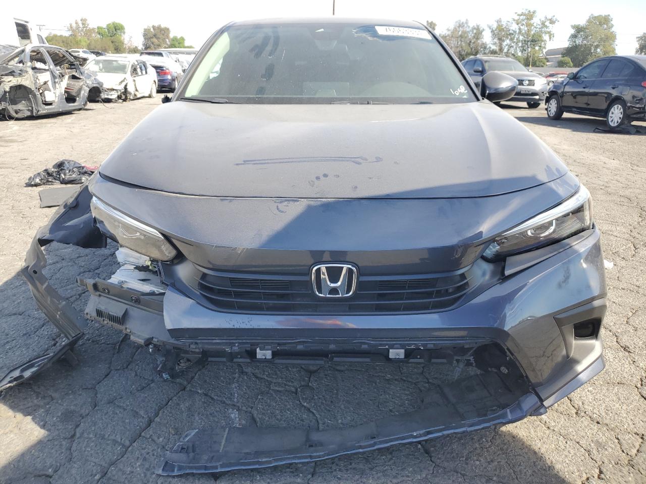 2023 Honda Civic VIN 2HGFE2F2XPH560745 Copart auction photo, front end / side damage thumbnail 5