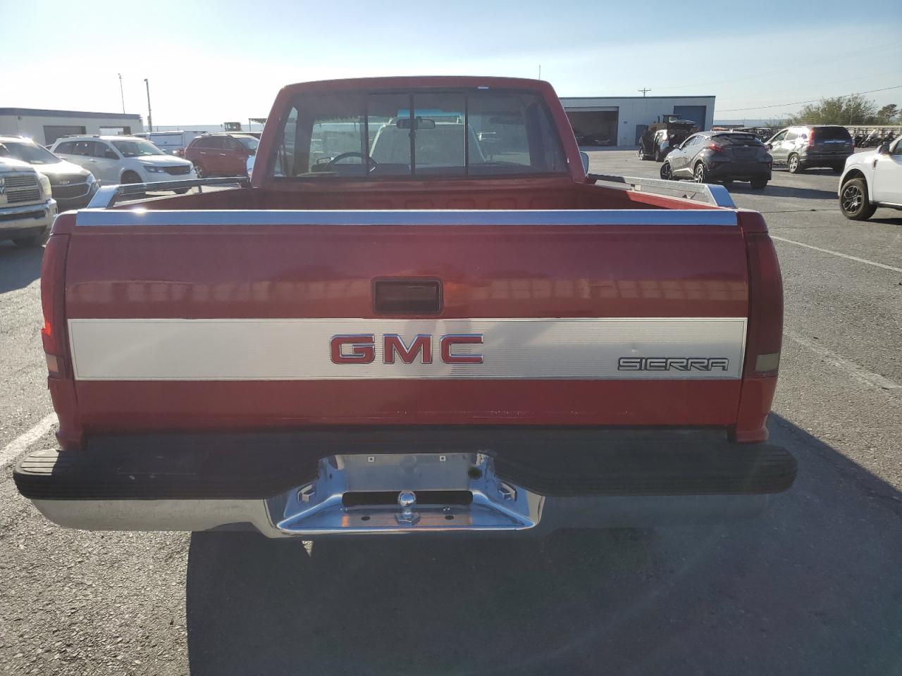 1990 GMC Sierra VIN 1GTDC14H3LZ555877 Copart auction photo, side / rear end damage thumbnail 6