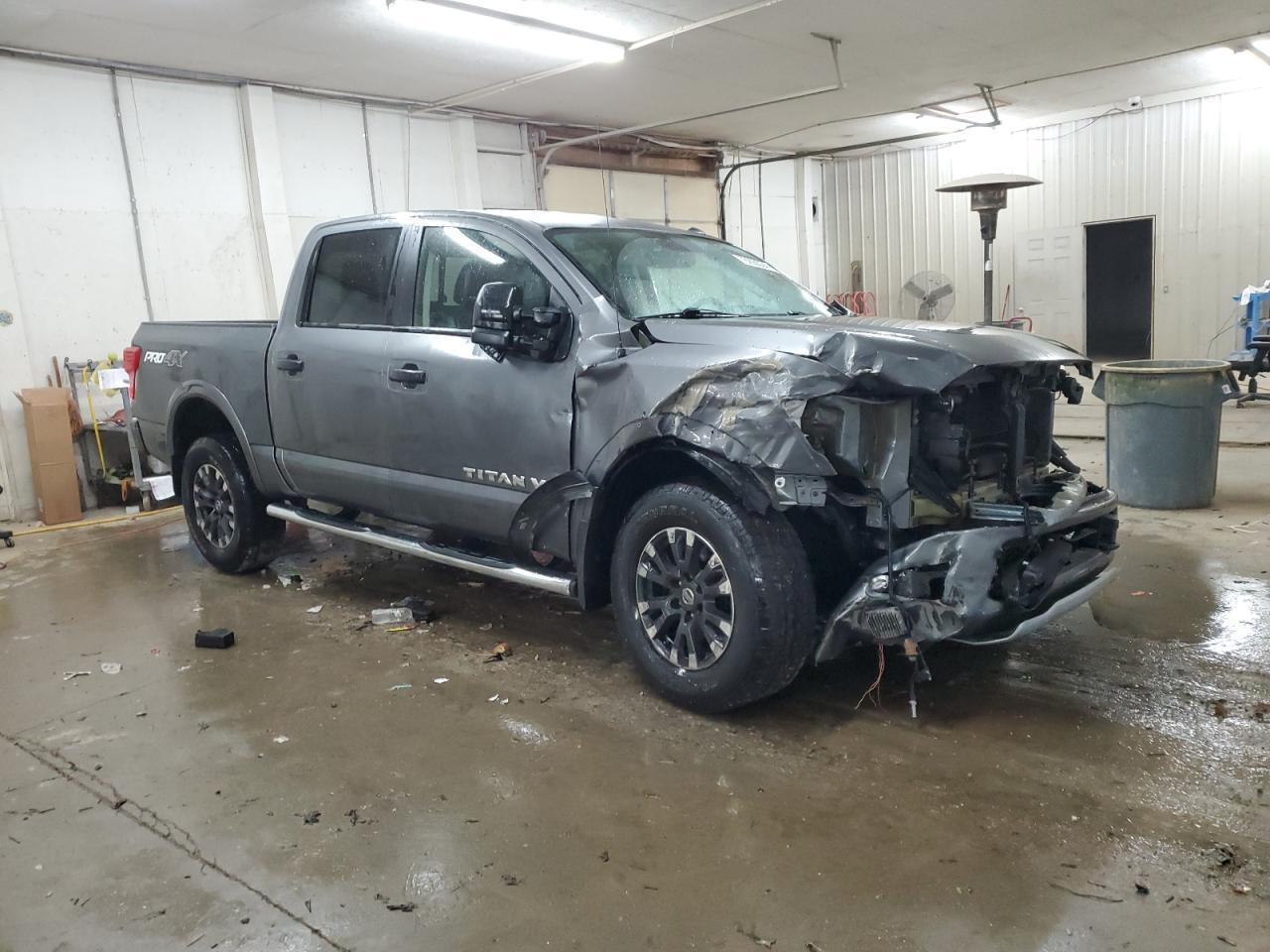 2019 Nissan Titan VIN 1N6AA1E5XKN526277 Copart auction photo, front end / side damage thumbnail 4
