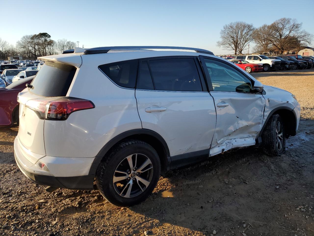 2018 Toyota RAV 4 VIN 2T3WFREV3JW521261 Copart auction photo, side damage thumbnail 3