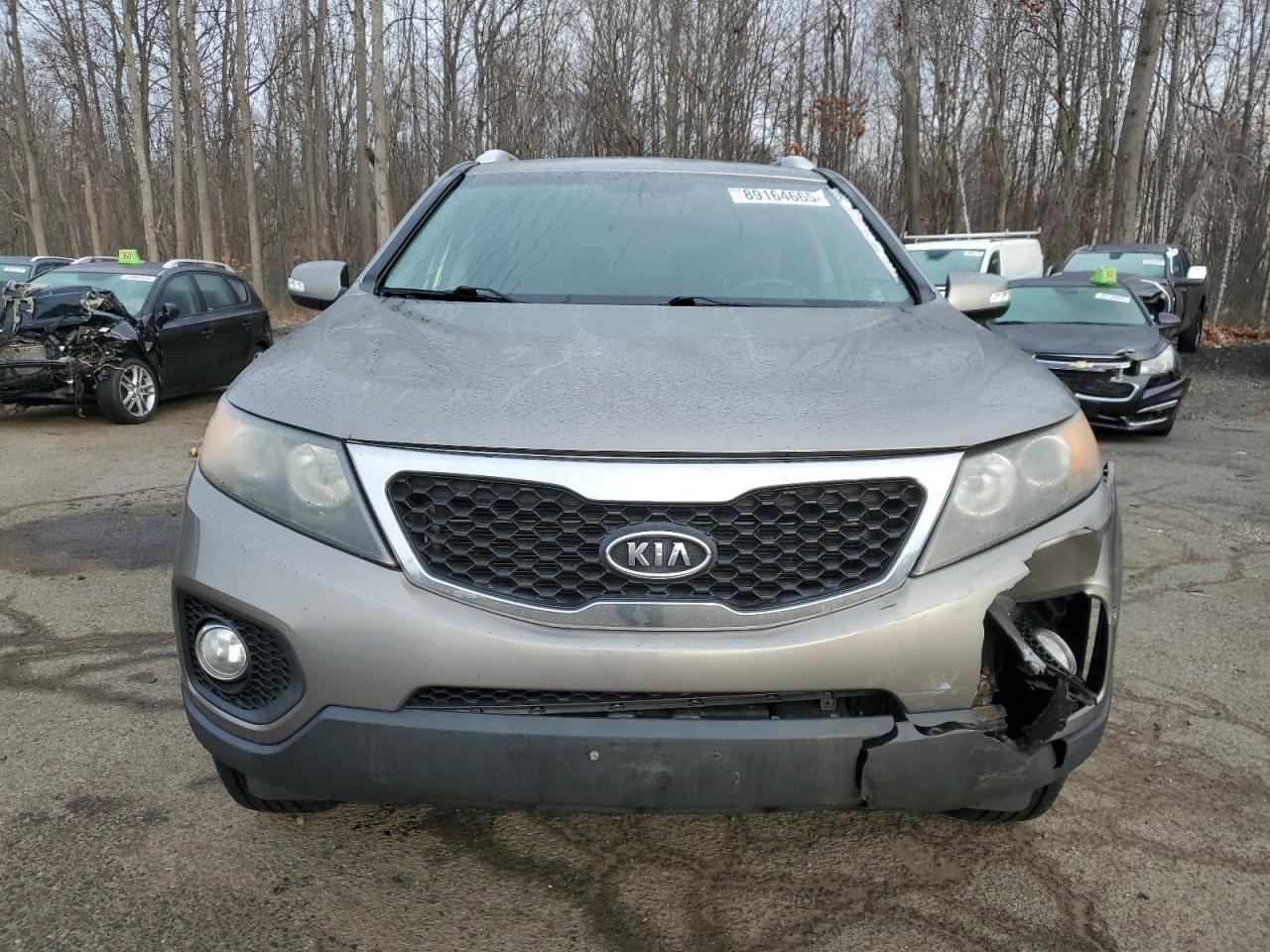 2011 KIA Sorento VIN 5XYKT4A11BG021029 Copart auction photo, front end / minor dent/scratches damage thumbnail 5