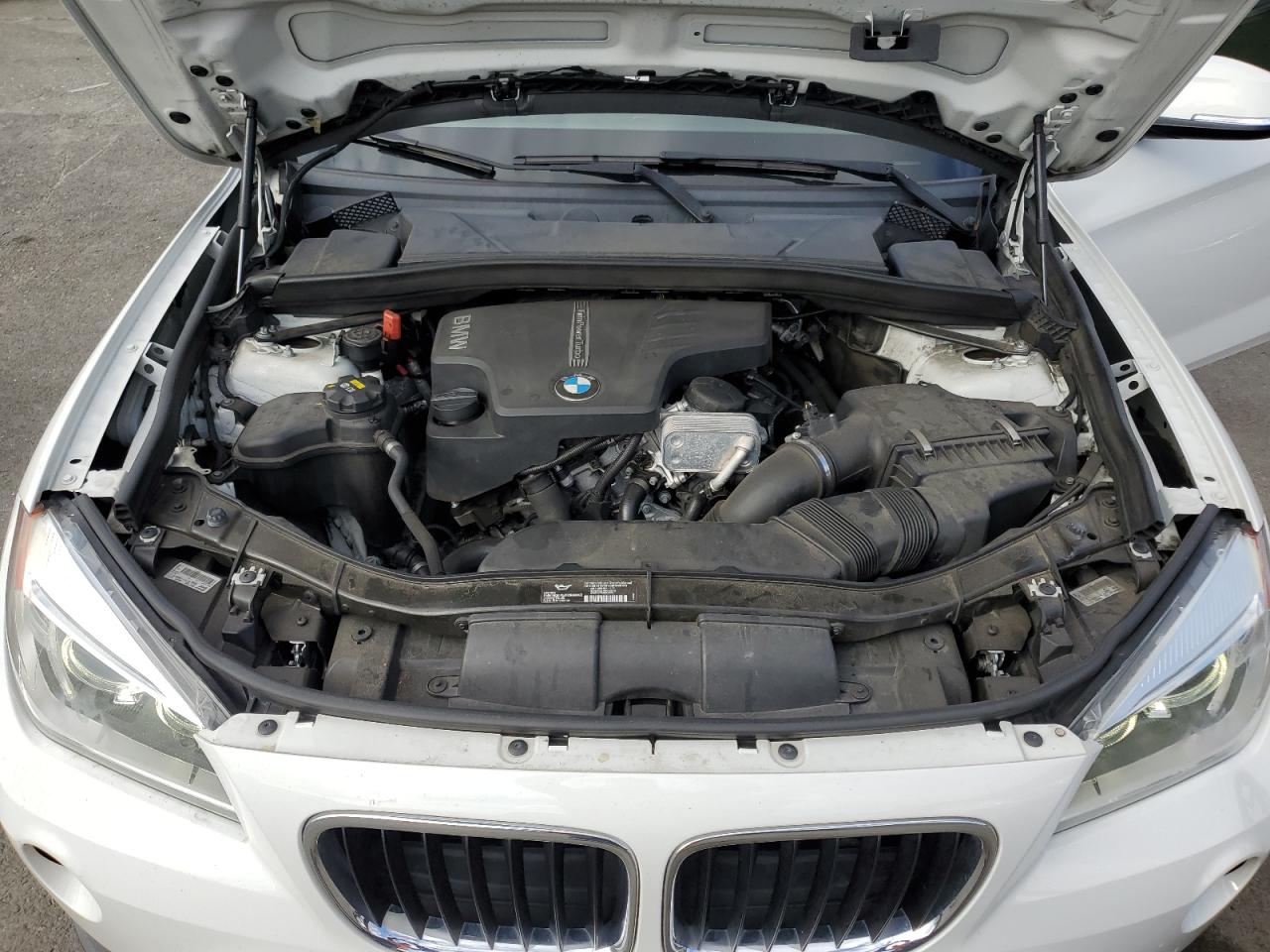 2015 BMW X1 VIN WBAVM1C59FV318828 Copart auction photo, side damage thumbnail 11