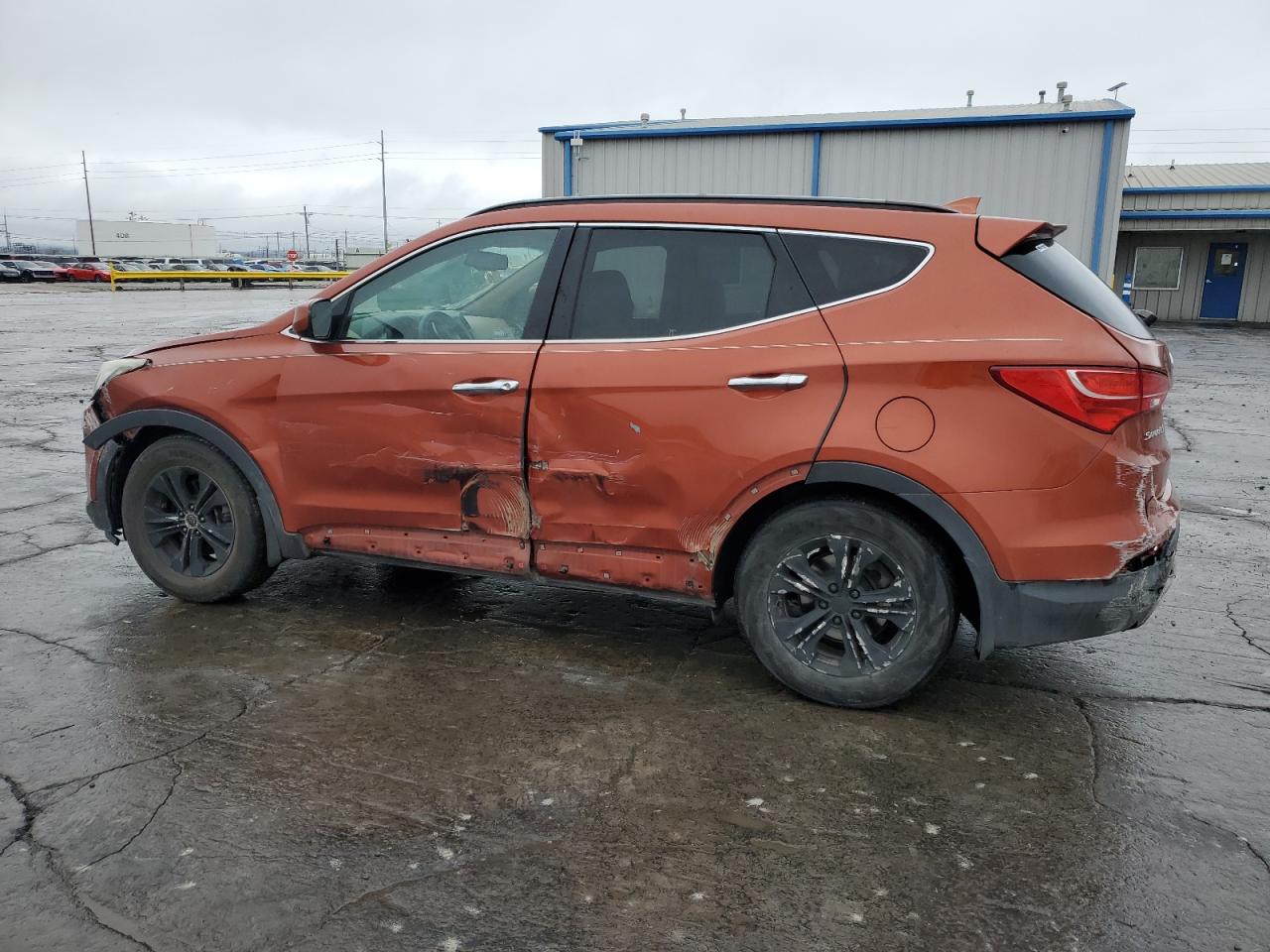 2015 Hyundai Santa Fe VIN 5XYZU3LB4FG285461 Copart auction photo, all over / undercarriage damage thumbnail 2