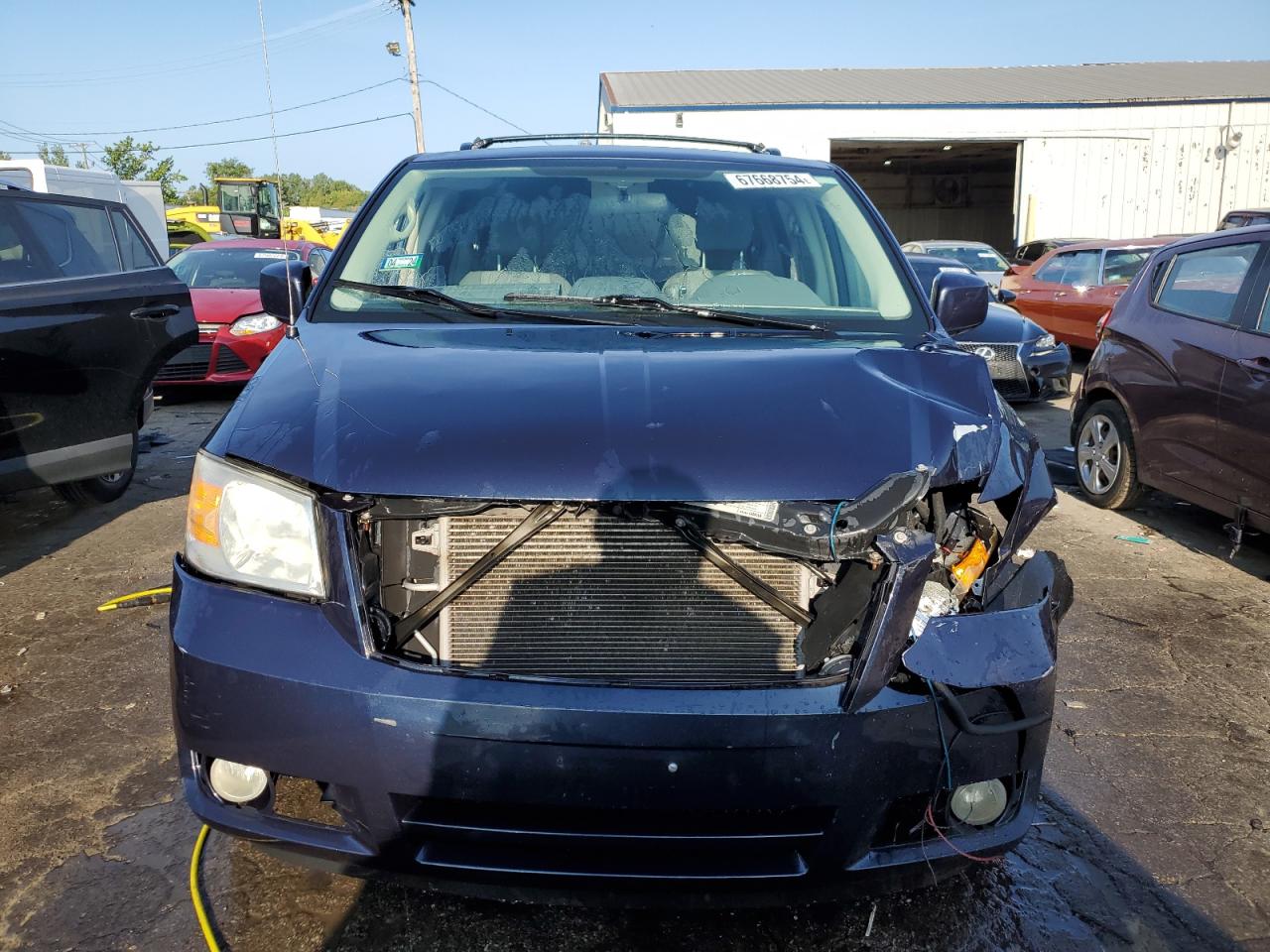 2009 Dodge Caravan VIN 2D8HN54X19R529695 Copart auction photo, front end damage thumbnail 5