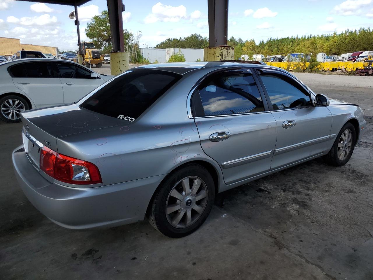 2005 KIA Optima VIN KNAGD128X55420903 Copart auction photo, front end damage thumbnail 3