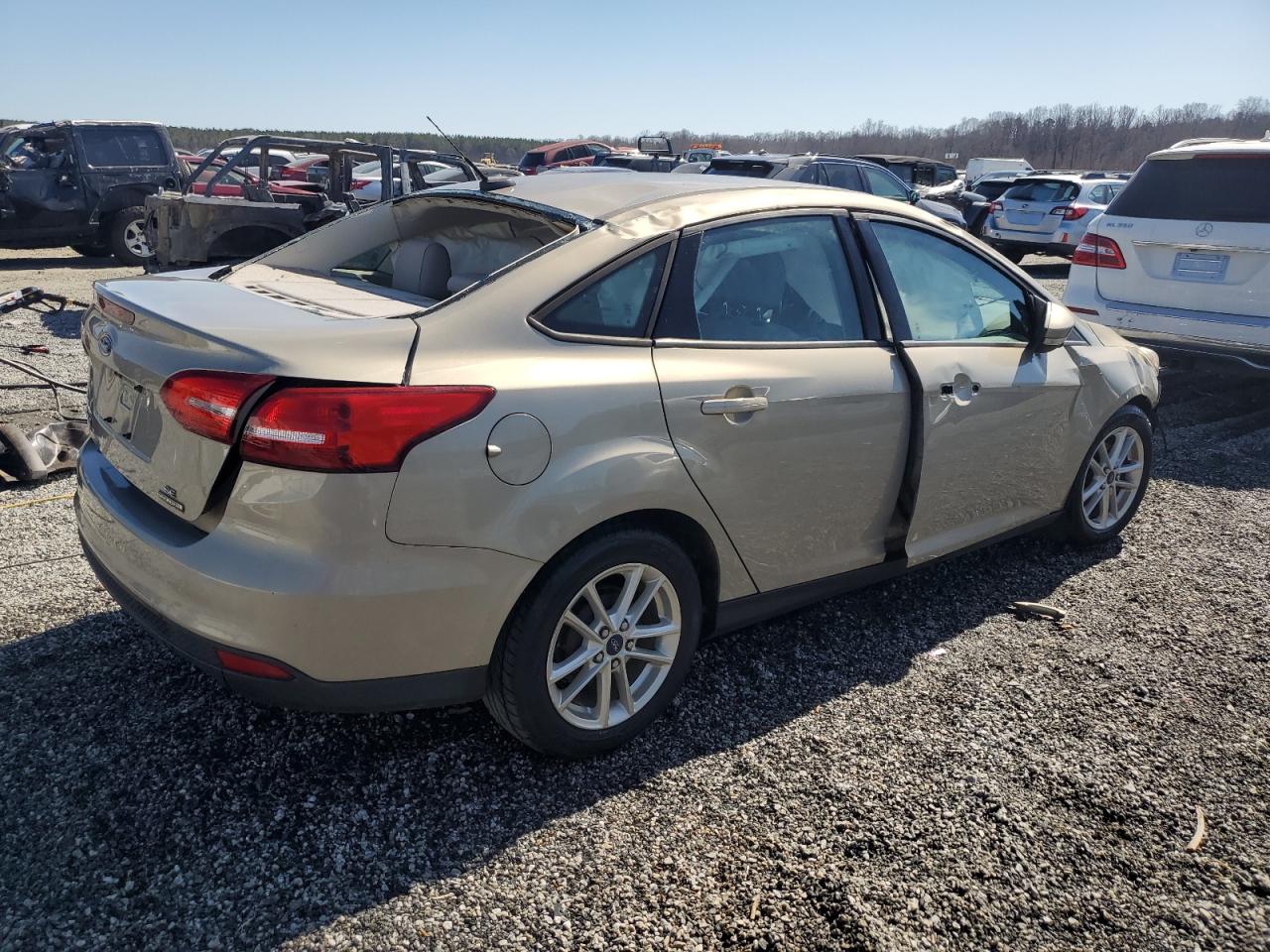 2016 Ford Focus VIN 1FADP3F23GL266005 Copart auction photo, rollover damage thumbnail 3