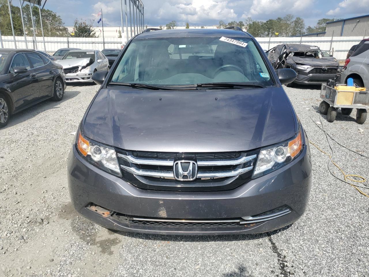 2016 Honda Odyssey VIN 5FNRL5H2XGB168032 Copart auction photo, side damage thumbnail 5