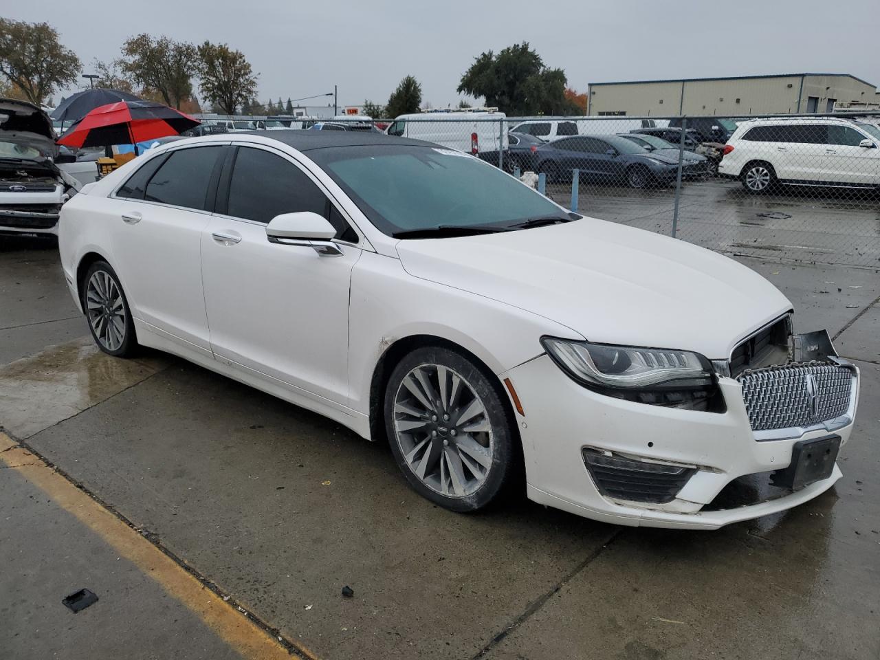 2017 Lincoln MKZ VIN 3LN6L5MU0HR644519 Copart auction photo, side / front end damage thumbnail 4