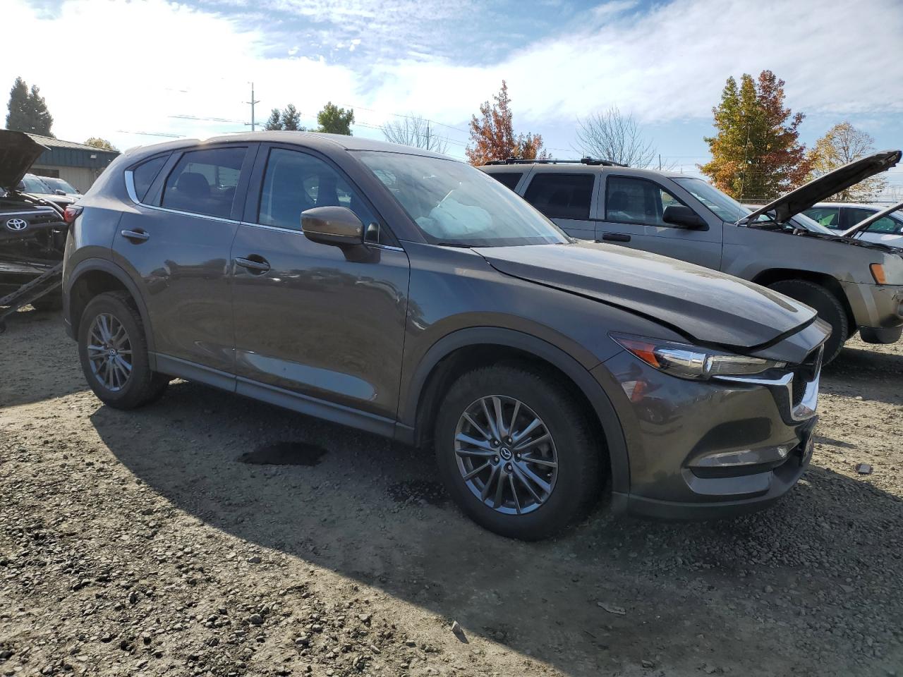 2019 Mazda CX-5 VIN JM3KFACM3K0616684 Copart auction photo, front end / side damage thumbnail 4
