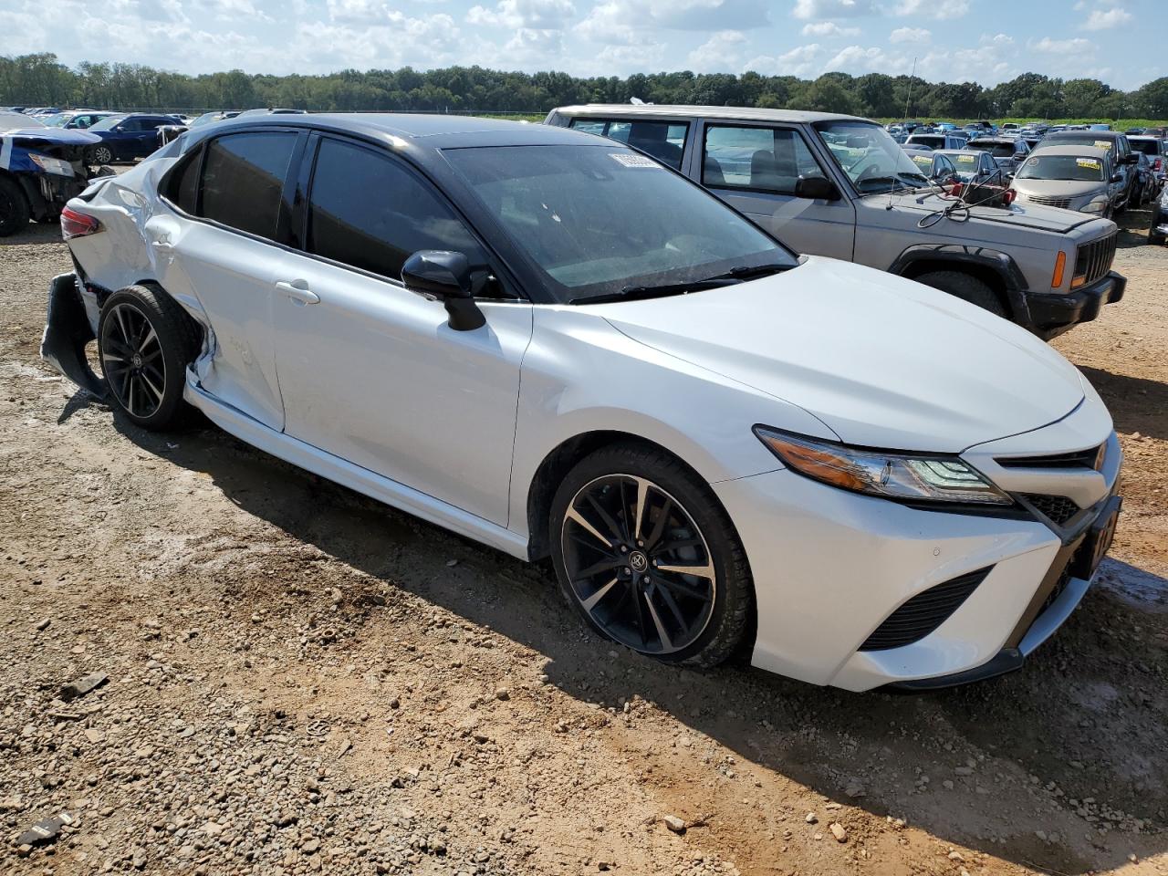 2019 Toyota Camry VIN 4T1BZ1HK3KU033009 Copart auction photo, side / rear end damage thumbnail 4