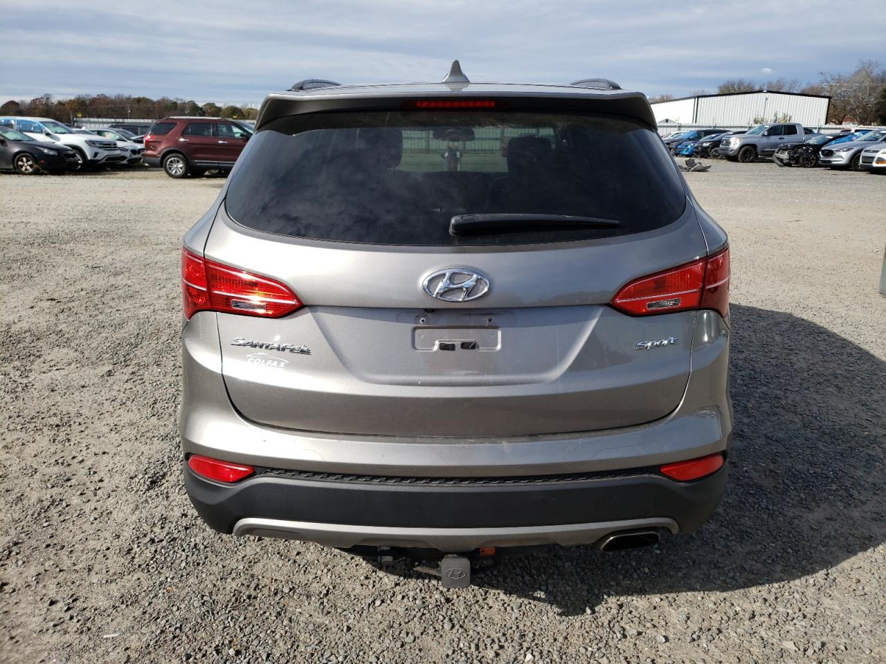 2015 Hyundai Santa Fe VIN 5XYZU3LB7FG304259 Copart auction photo, front end damage thumbnail 6