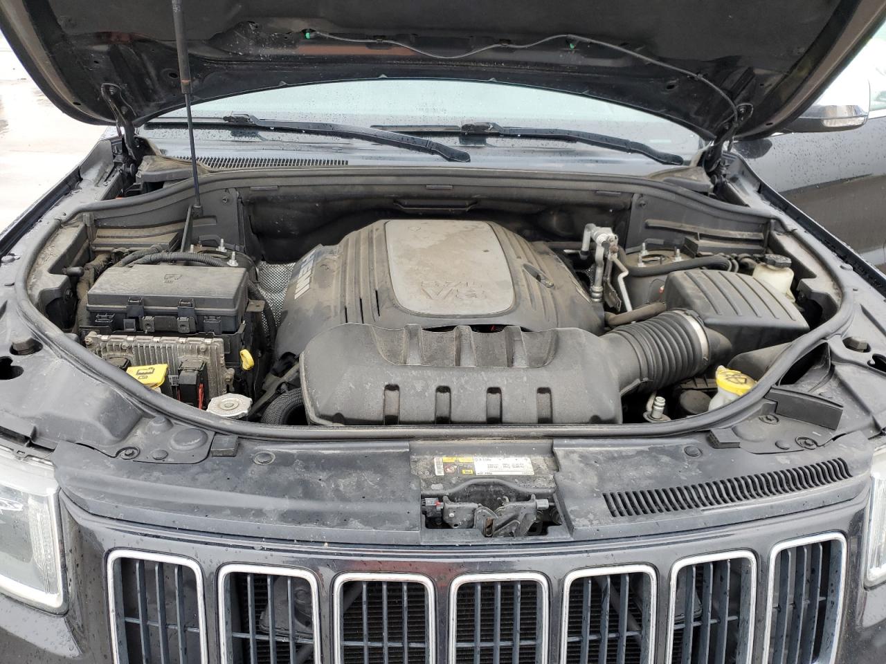 2014 Jeep Grand Cherokee VIN 1C4RJFBT0EC119221 Copart auction photo, unknown damage thumbnail 12