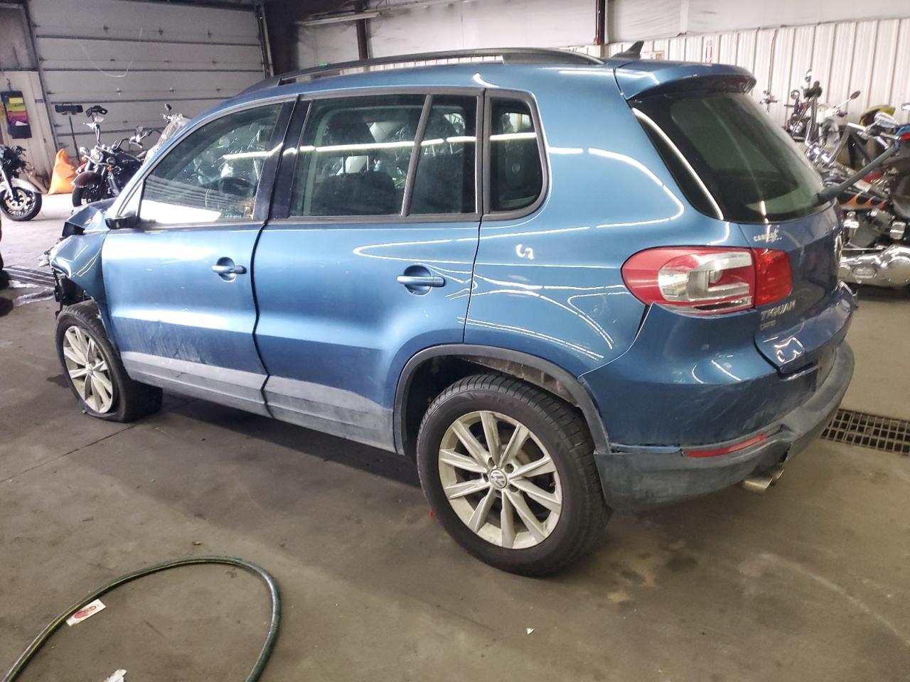2017 Volkswagen Tiguan VIN WVGBV7AX7HK042479 Copart auction photo, all over damage thumbnail 2