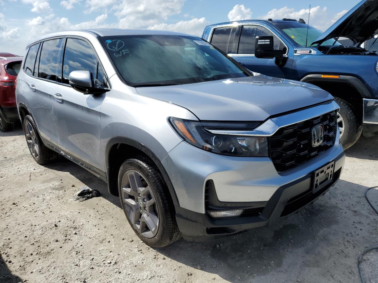 2022 Honda Passport VIN 5FNYF8H59NB022443 Copart auction photo, water/flood damage thumbnail 4