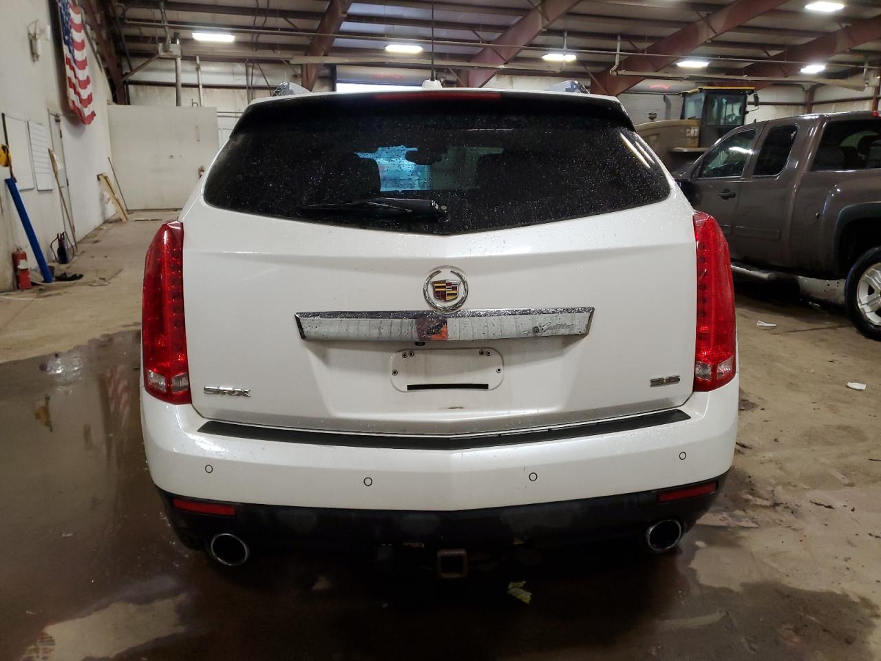 2016 Cadillac SRX VIN 3GYFNBE38GS524116 Copart auction photo, side / front end damage thumbnail 6