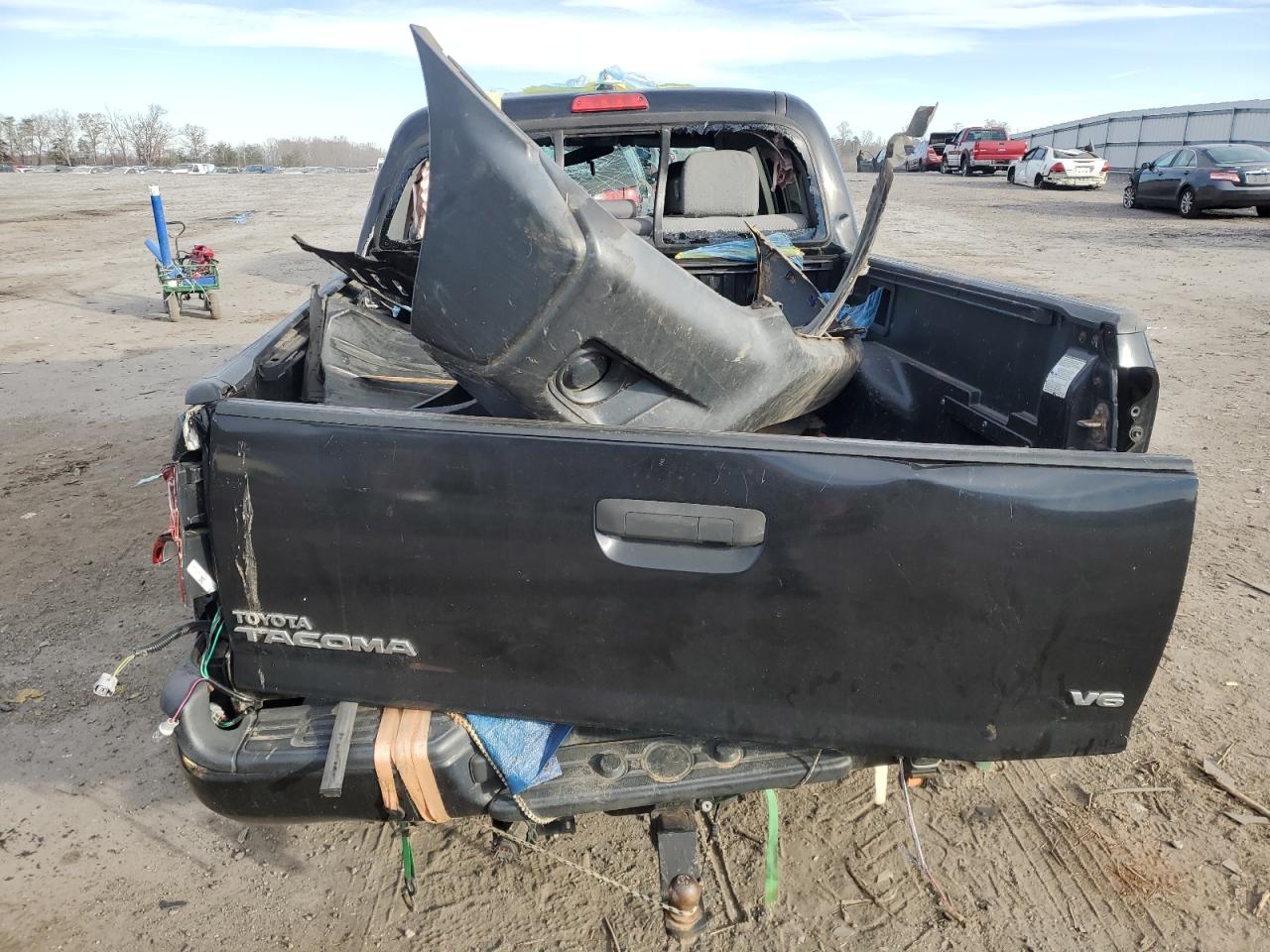 2012 Toyota Tacoma VIN 5TFLU4EN1CX033131 Copart auction photo, all over damage thumbnail 6