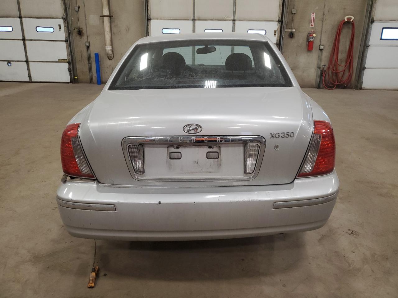 2004 Hyundai Grandeur VIN KMHFU45E64A340498 Copart auction photo, side damage thumbnail 6