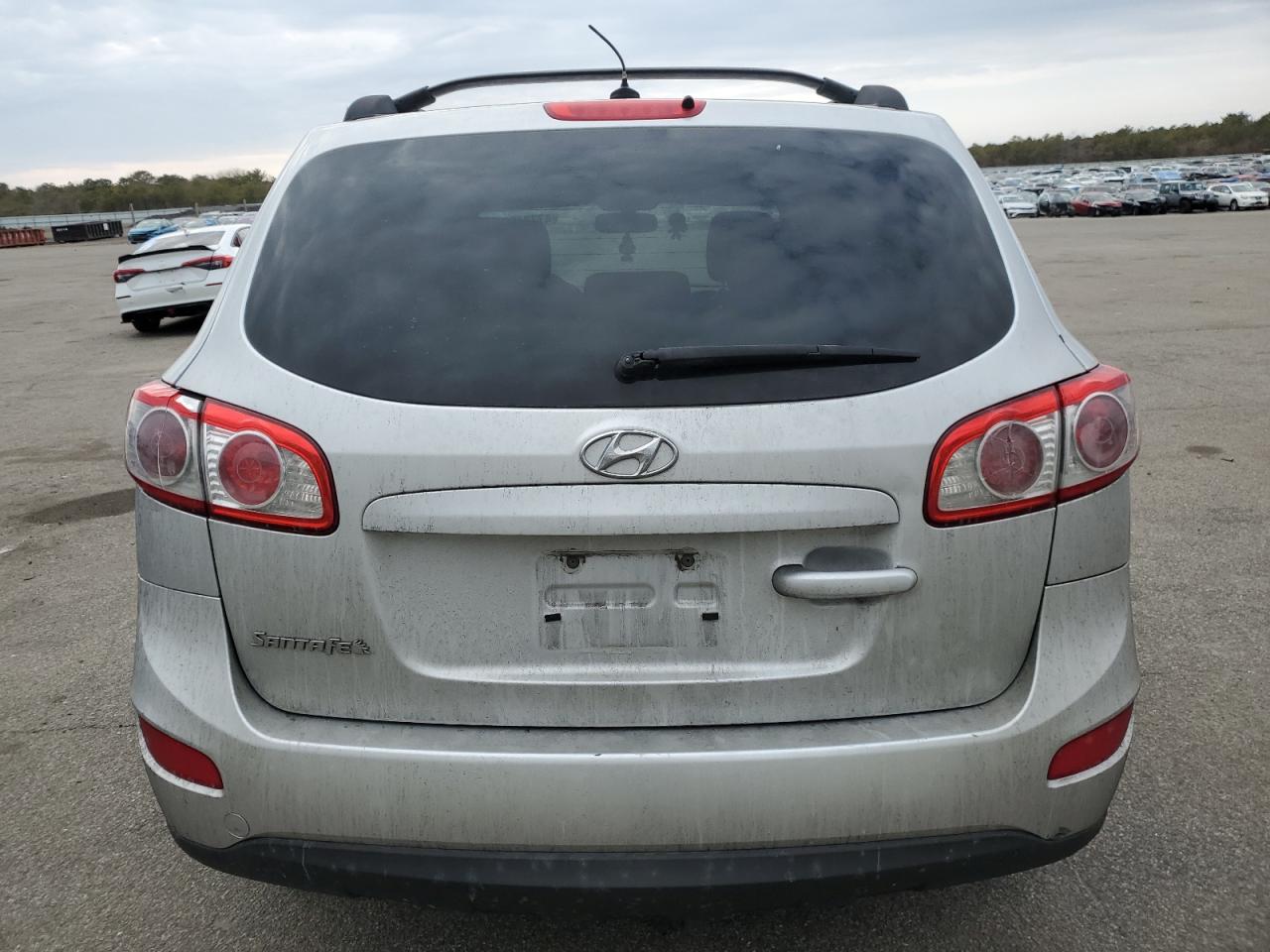 2012 Hyundai Santa Fe VIN 5XYZG3AB2CG123706 Copart auction photo, front end / minor dent/scratches damage thumbnail 6