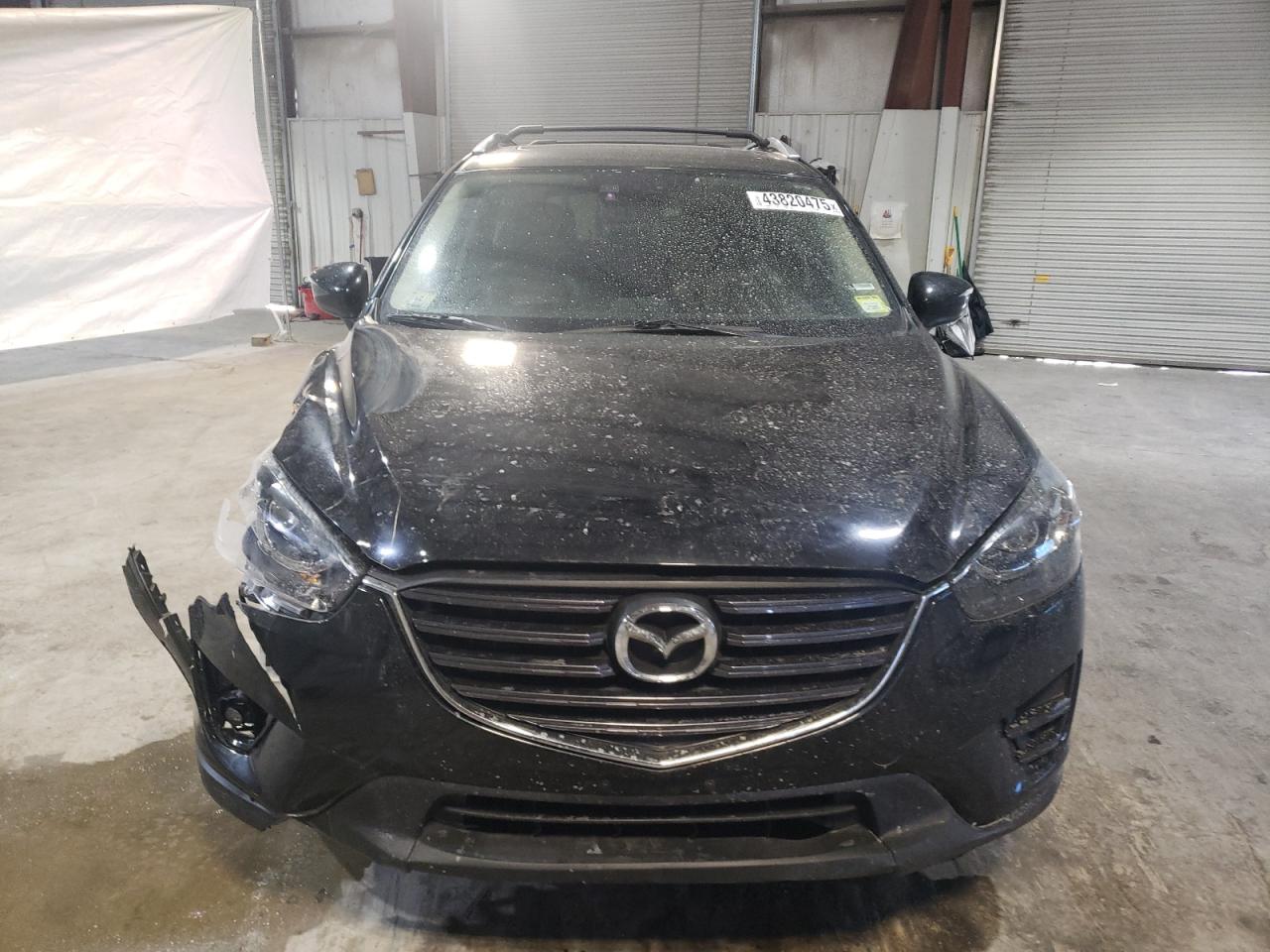 2016 Mazda CX-5 VIN JM3KE4DY6G0655802 Copart auction photo, side damage thumbnail 5