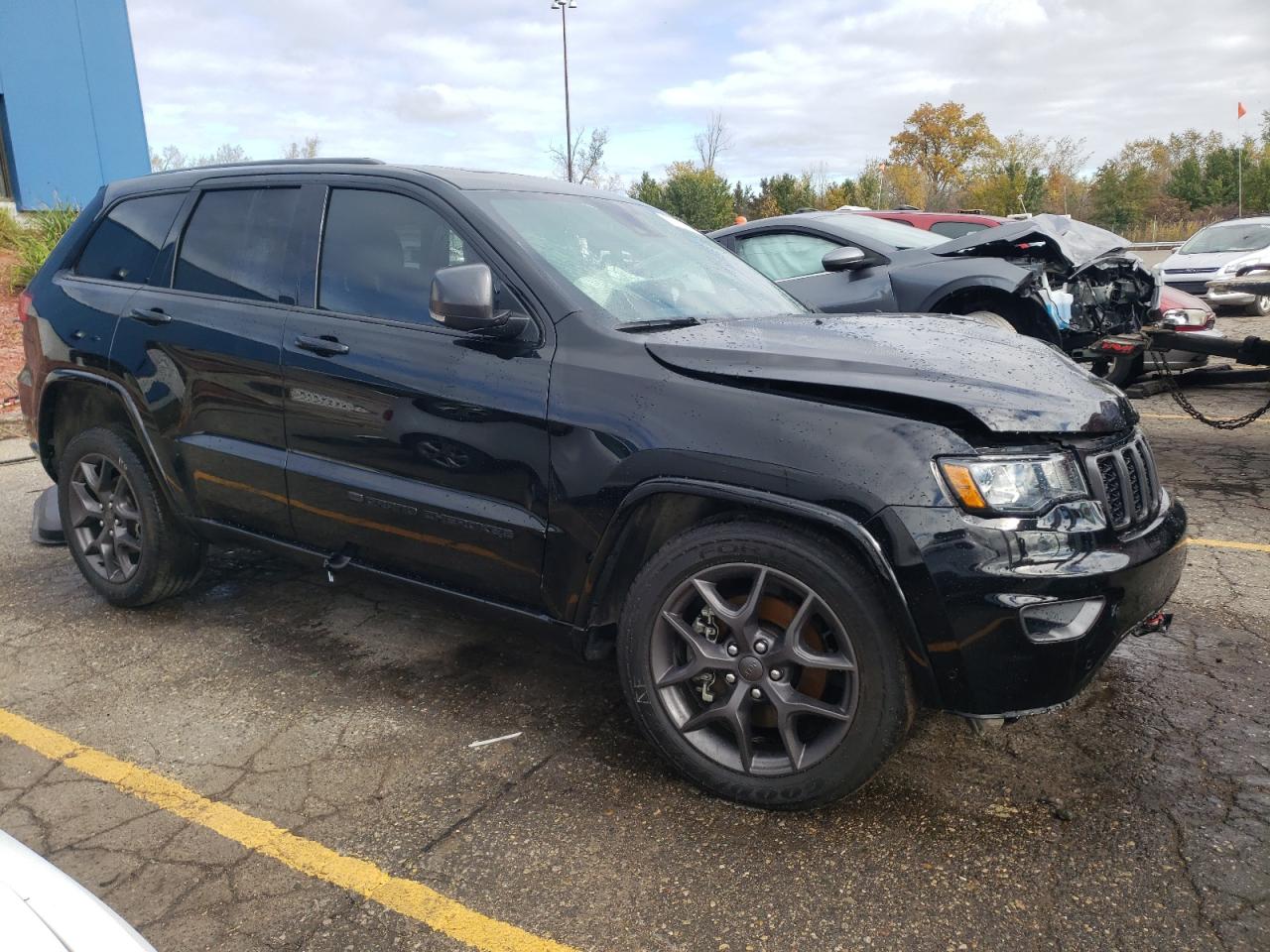 2021 Jeep Grand Cherokee VIN 1C4RJFBGXMC704471 Copart auction photo, side / front end damage thumbnail 4