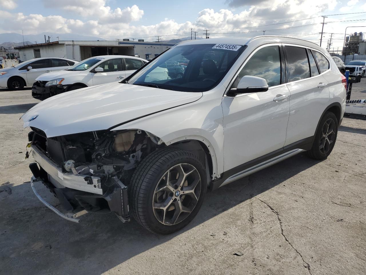 2019 BMW X1 VIN WBXHU7C54K3H44277 - Copart auction photo