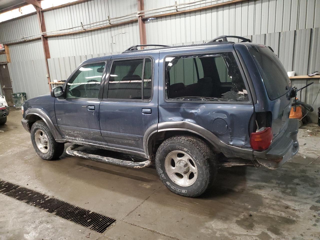 2000 Ford Explorer VIN 1FMZU73E9YZC59763 Copart auction photo, side / rear end damage thumbnail 2