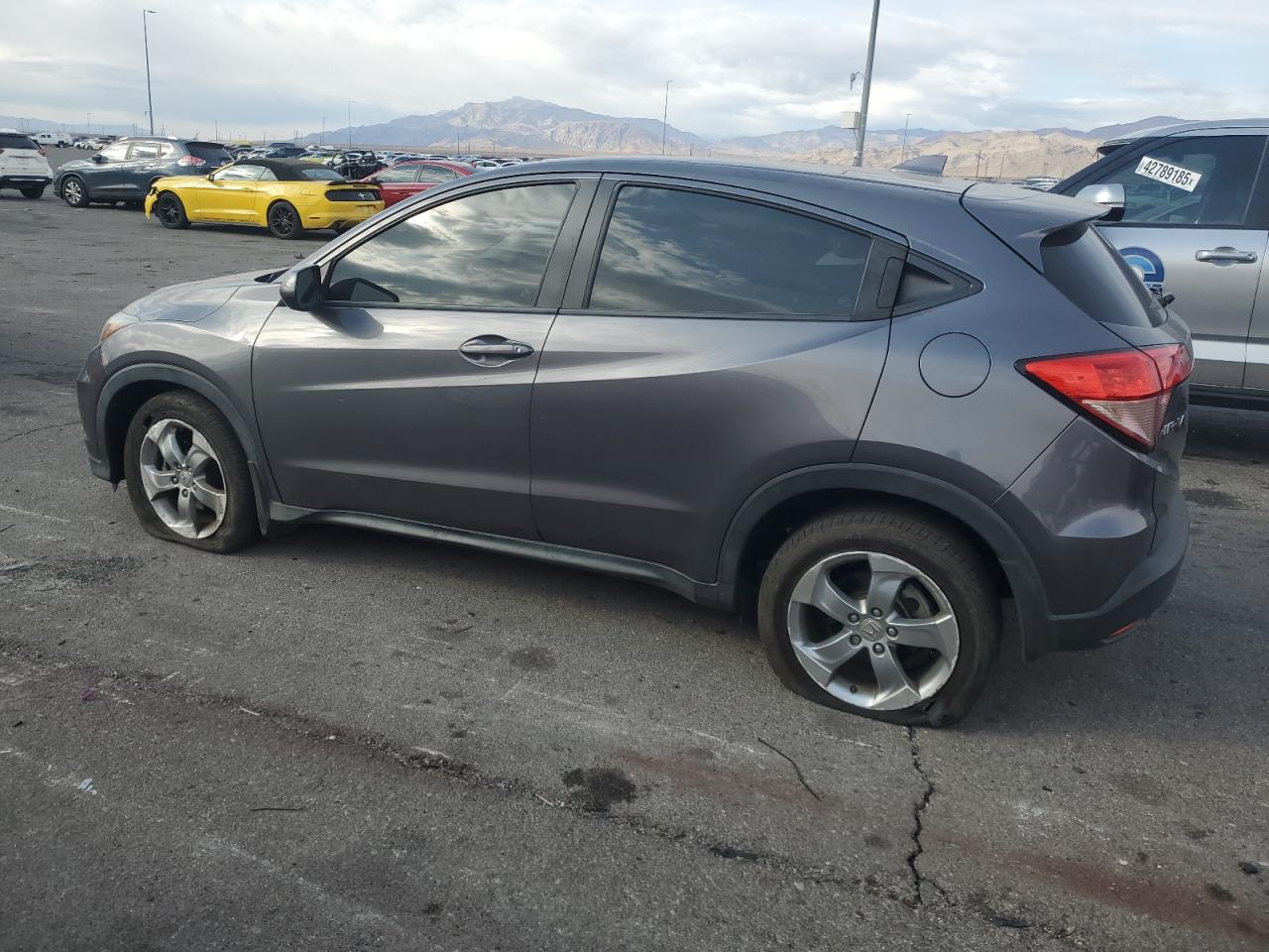 2017 Honda HR-V VIN 3CZRU5H31HG700327 Copart auction photo, side damage thumbnail 2