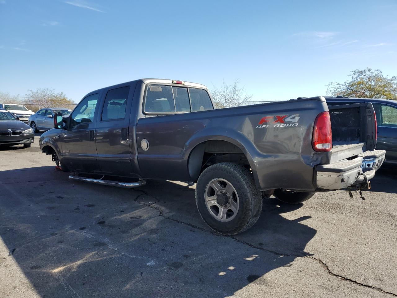 2004 Ford F350 VIN 1FTSW31P24EB81731 Copart auction photo, vandalism damage thumbnail 2
