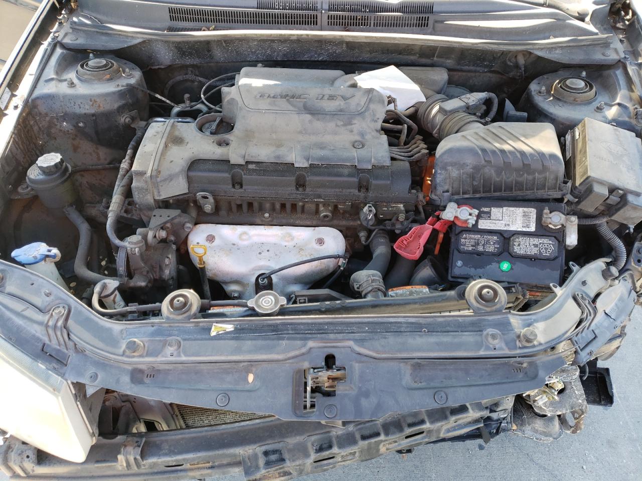 2009 KIA Spectra VIN KNAFE221695620345 Copart auction photo, front end / all over damage thumbnail 12