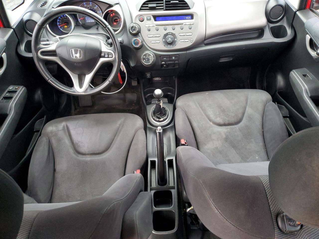 2009 Honda Fit VIN JHMGE87409S041347 Copart auction photo, rear end damage thumbnail 8