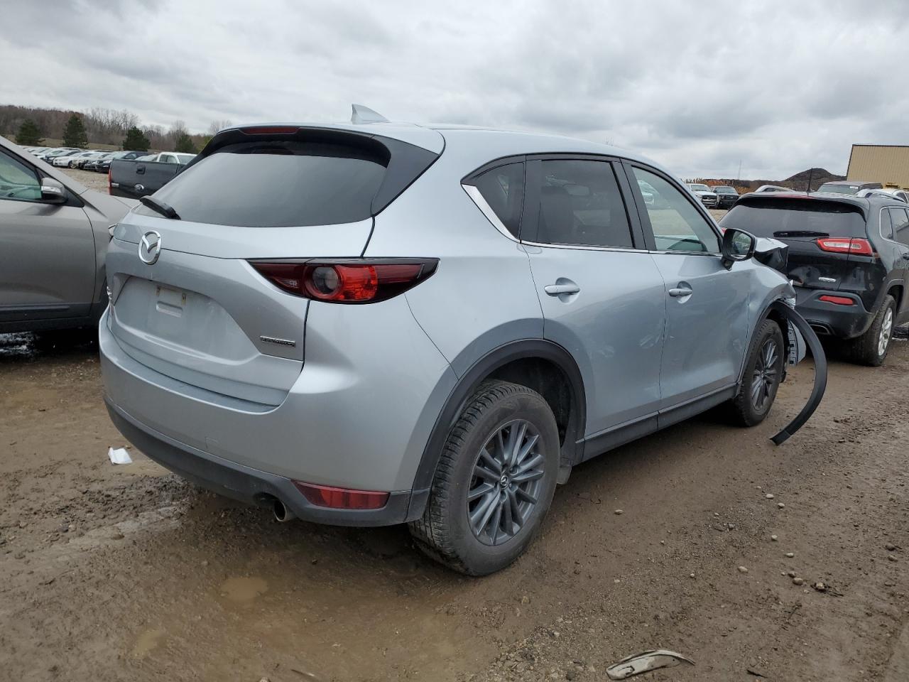 2021 Mazda CX-5 VIN JM3KFBCM7M1474827 Copart auction photo, front end / side damage thumbnail 3