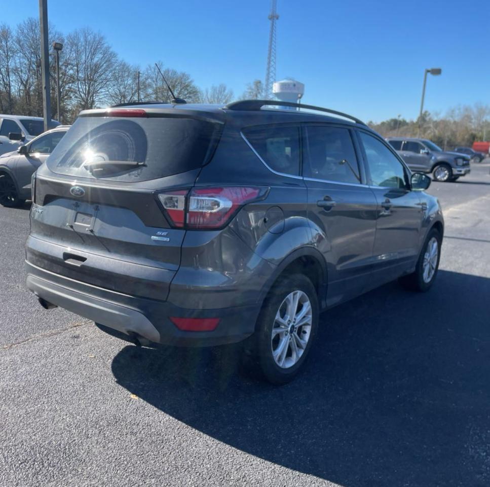 2018 Ford Escape VIN 1FMCU0GD7JUB61798 Copart auction photo, minor dent/scratches / normal wear damage thumbnail 3