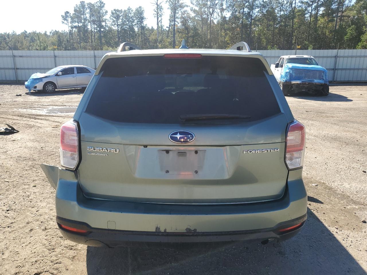 2018 Subaru Forester VIN JF2SJAGCXJH566389 Copart auction photo, rear end / side damage thumbnail 6