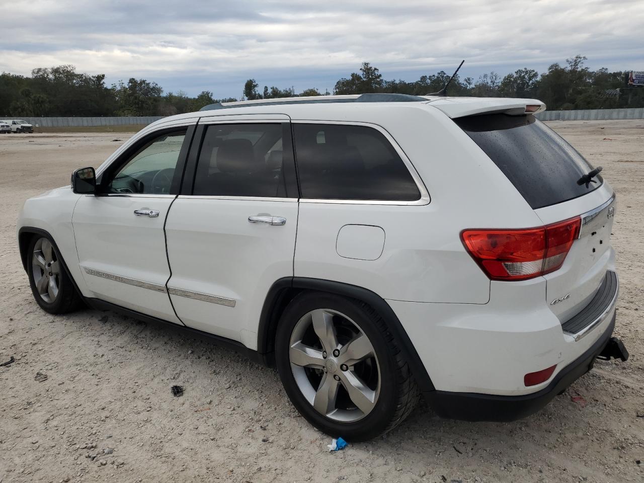 2013 Jeep Grand Cherokee VIN 1C4RJFCT9DC524815 Copart auction photo, minor dent/scratches damage thumbnail 2